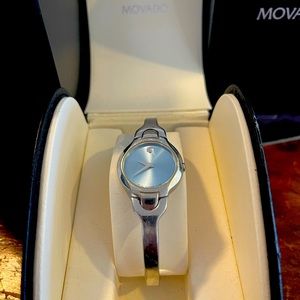 Baby blue face movado bangle watch.